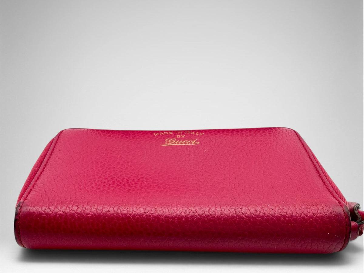 Gucci pink zip wallet