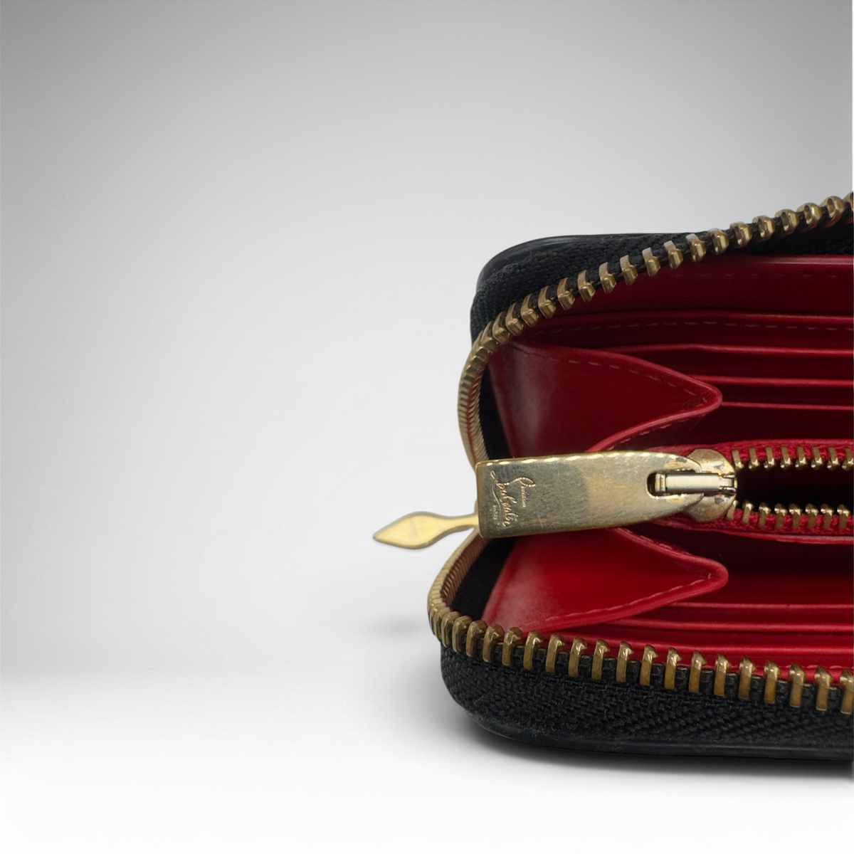 Louboutin zippy long black leather