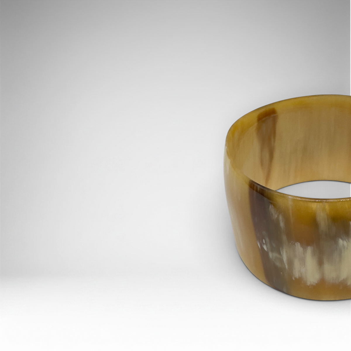 Tommy Bahama wide polished natural horn cuff bracelet with branded drawstring pouch