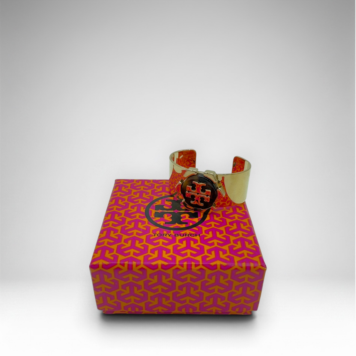 Tory Burch gold-tone open cuff bracelet with brown logo medallion and presentation box, view 3