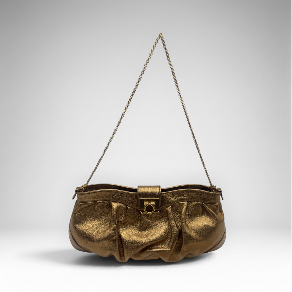 Salvatore Ferragamo metallic bronze pleated evening bag with Gancini clasp and chain strap