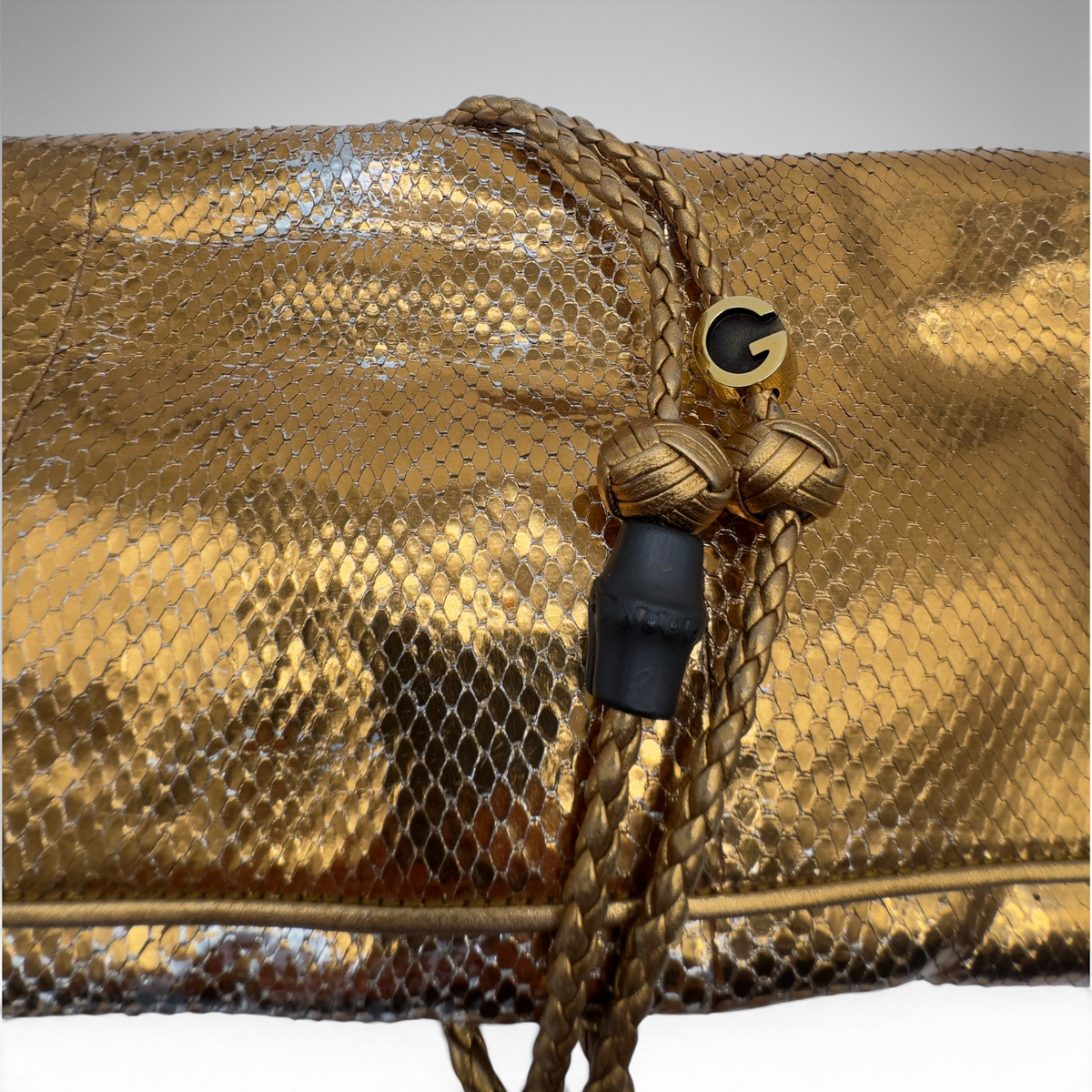 Gucci snakeskin gold clutch