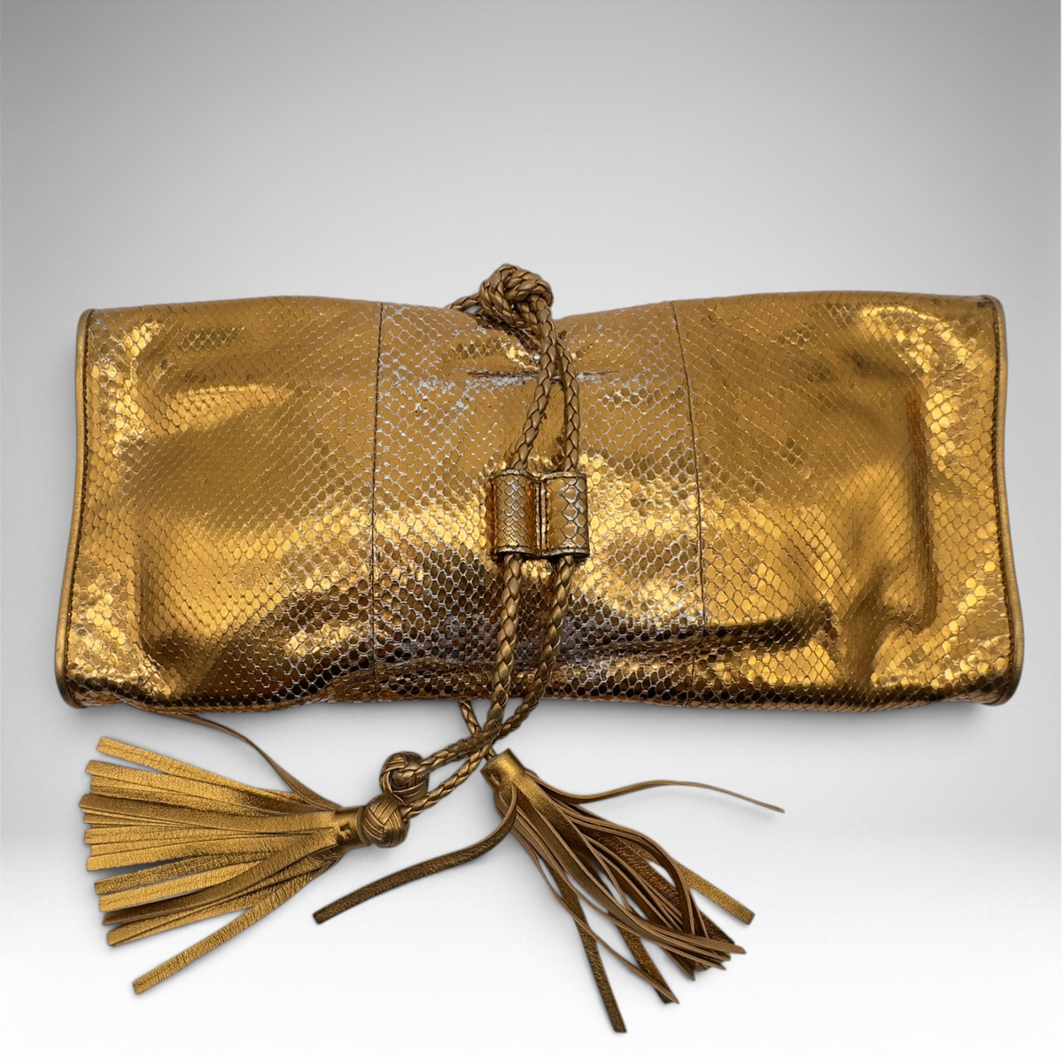Gucci snakeskin gold clutch