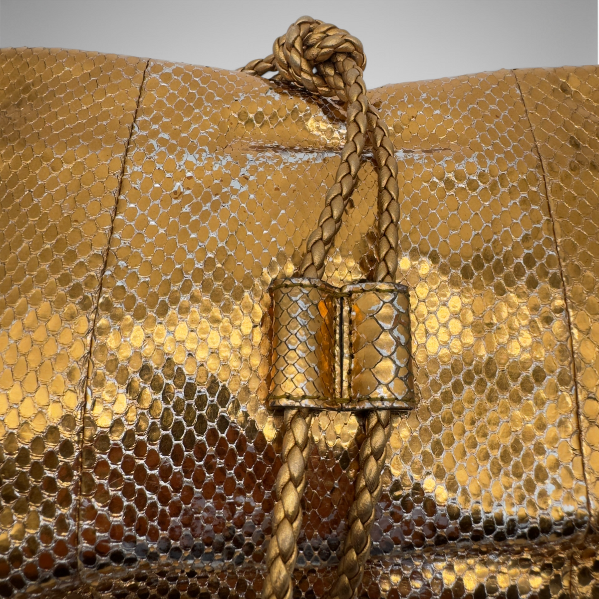Gucci snakeskin gold clutch