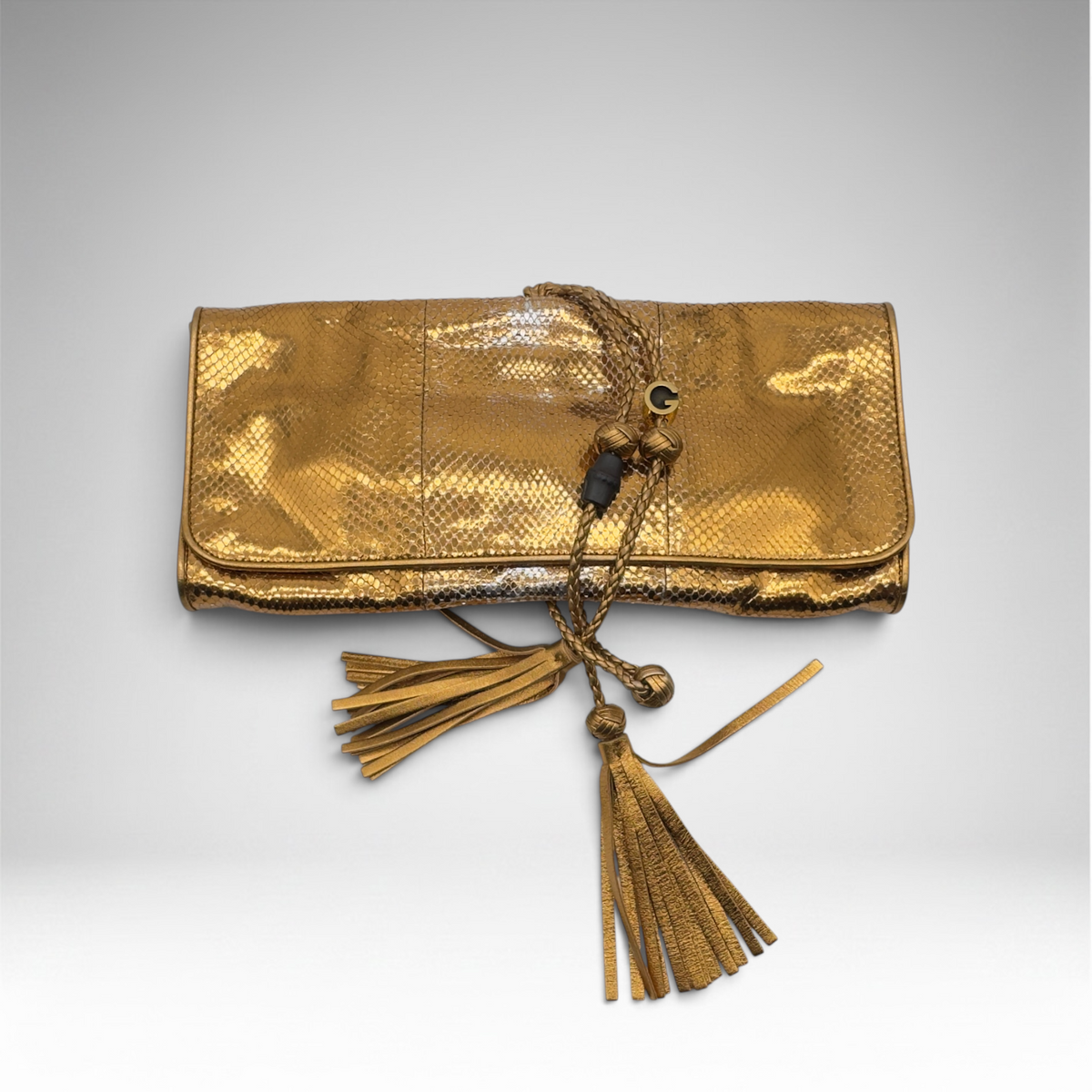 Gucci snakeskin gold clutch