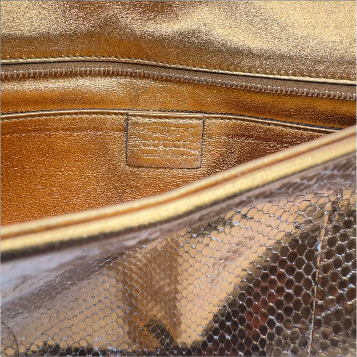 Gucci snakeskin gold clutch