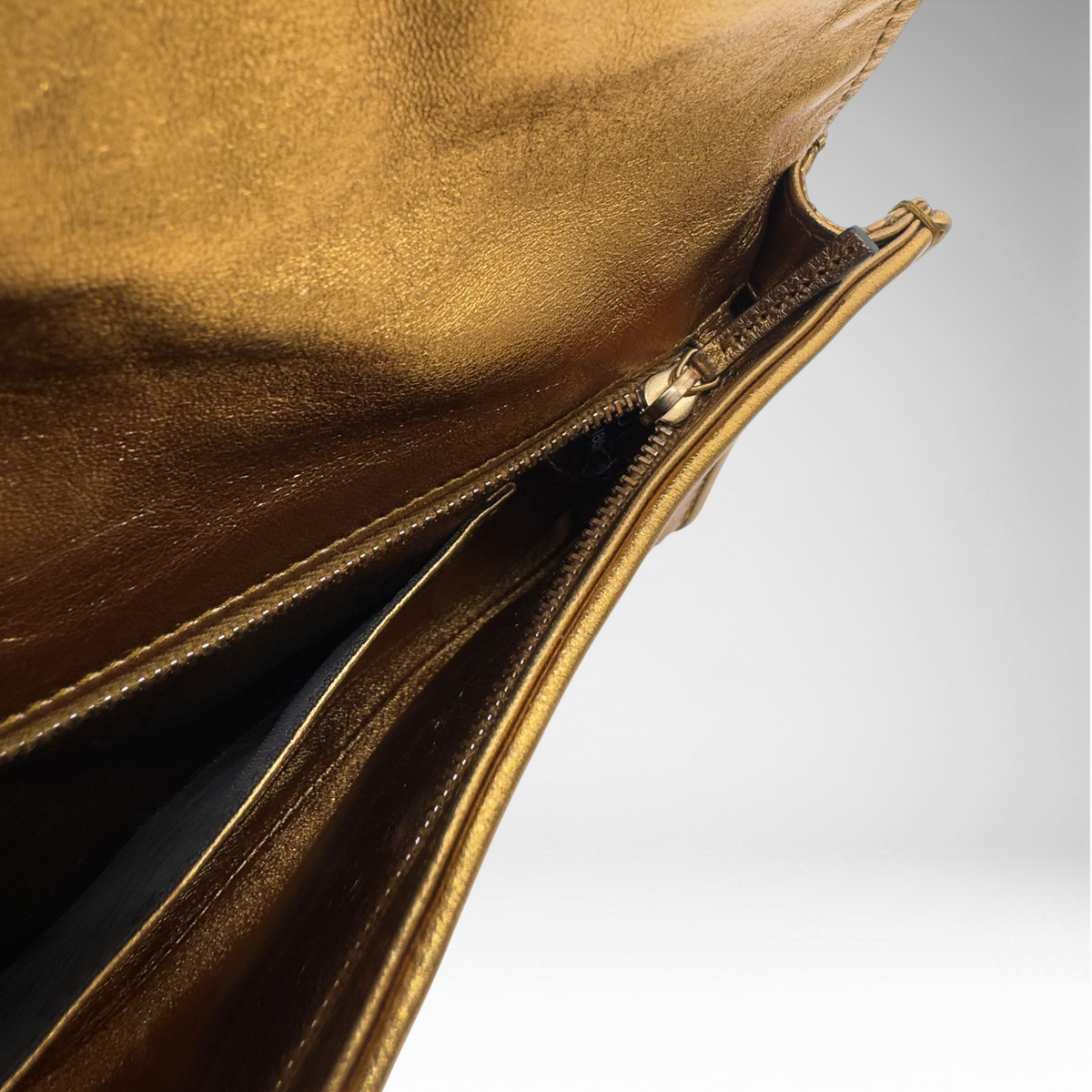 Gucci snakeskin gold clutch