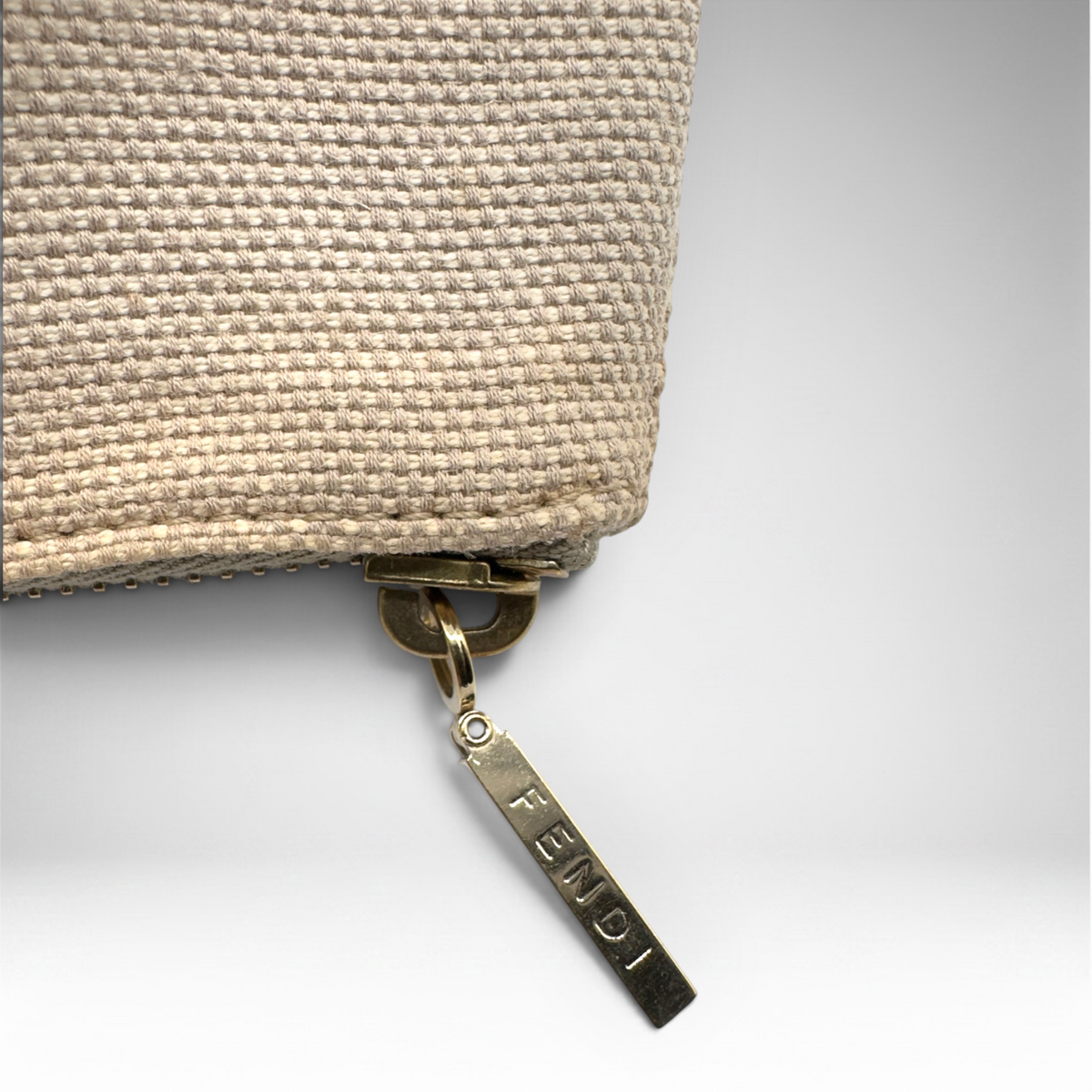 Fendi beige woven canvas pochette with mustard-yellow FF logo webbing and gold-tone zip closure, view 5