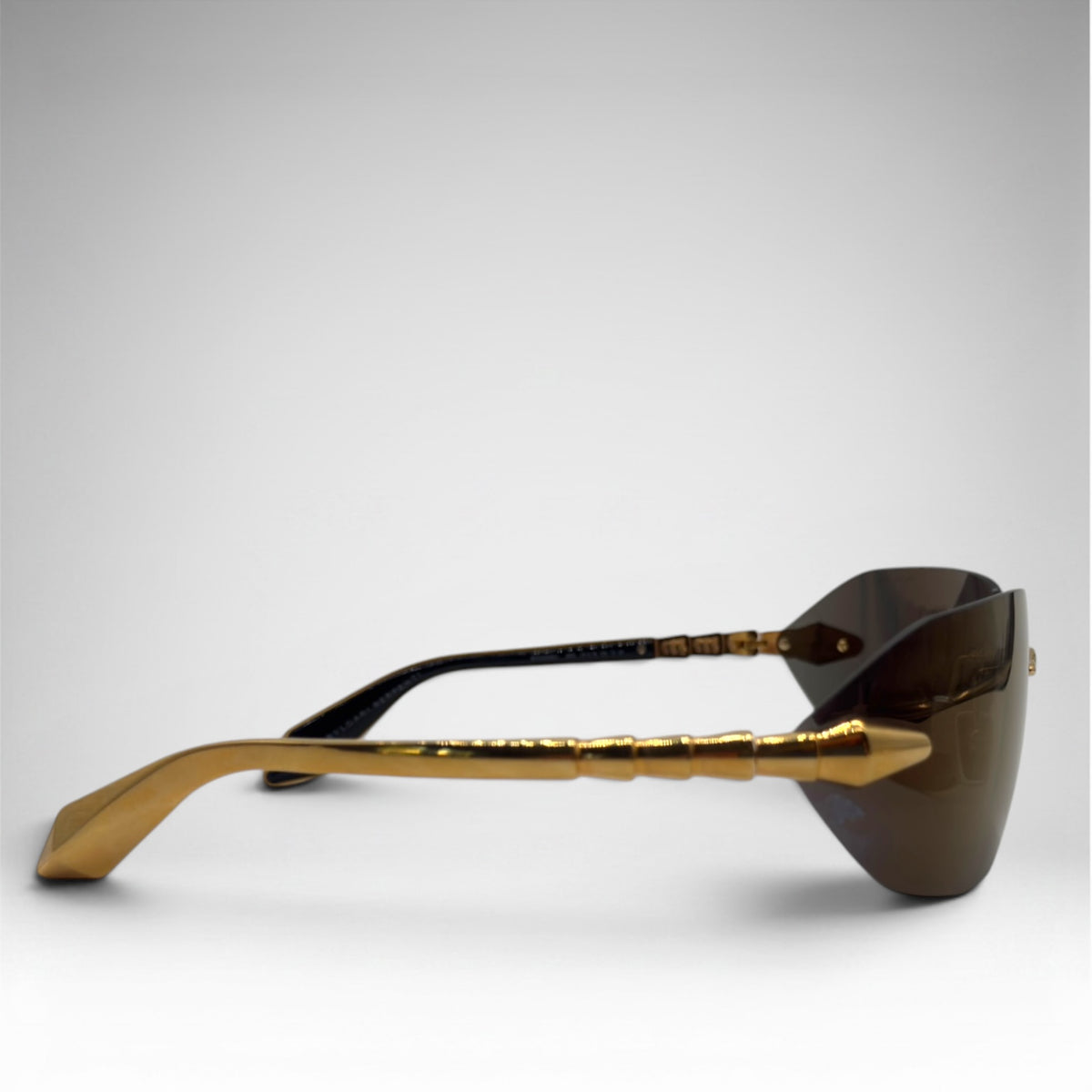 Bvlgari Serpenti Rimless Sunglasses – Gold / Brown